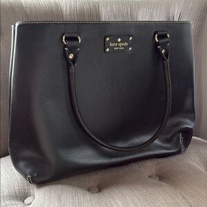 Kate Spade Black Tote with Structured Design and Metal Accents